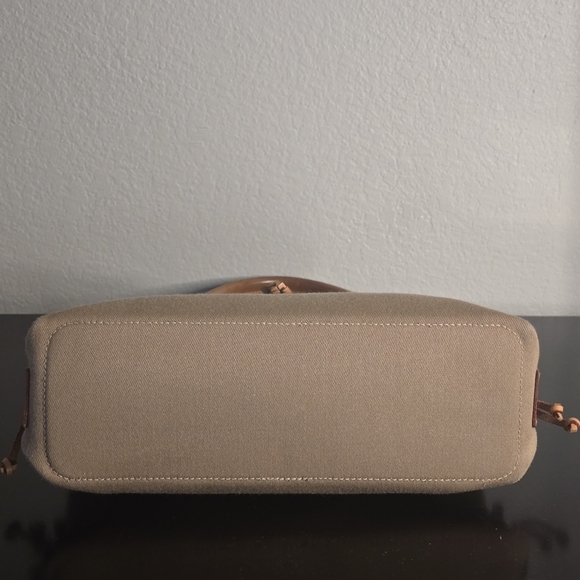 Dooney & Bourke Tassel Canvas/ Leather Satchel - Picture 9 of 12